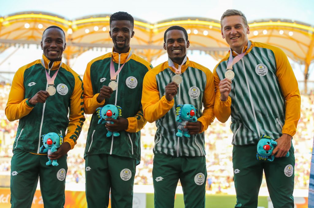 GOLD COAST, AUSTRALIA - APRIL 14: Akani Simbine, Anaso Jobodwana, Henricho Bruintjies and Emile Erasmus of South Africa with their silver medal in the mens 4x100m relay final during the athletics on day 10 of the Gold Coast 2018 Commonwealth Games at the Carrara Stadium on April 14, 2018 in Gold Coast, Australia.  (Photo by Roger Sedres/Gallo Images)