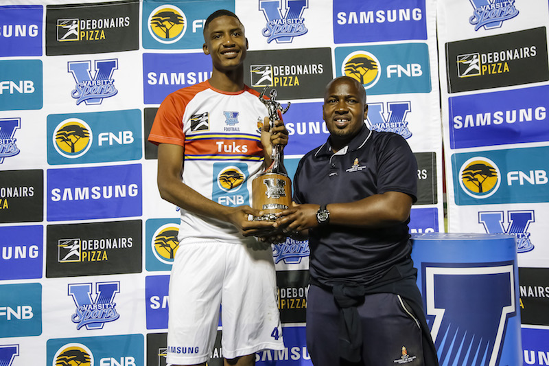 Captain of TUKS Lawrence Ntswane and coach Tlisane Motaung hold the trophy after winning the Final of the Varsity Football match between TUT and TUKS at TUT Stadium in Pretoria on 28th September, 2017. Photo by Dominic Barnardt/Varsity Sports